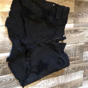 Ripped black shorts